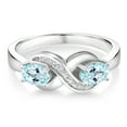 thumbnail image 2 of Gem Stone King 925 Sterling Silver Sky Blue Topaz and White Created Sapphire Infinity Love Knot Ring for Women | 1.11 Cttw | Oval 6X4MM | Gemstone Birthstone | Jewelry Gifts for Mom Wife Her | Size 9, 2 of 5