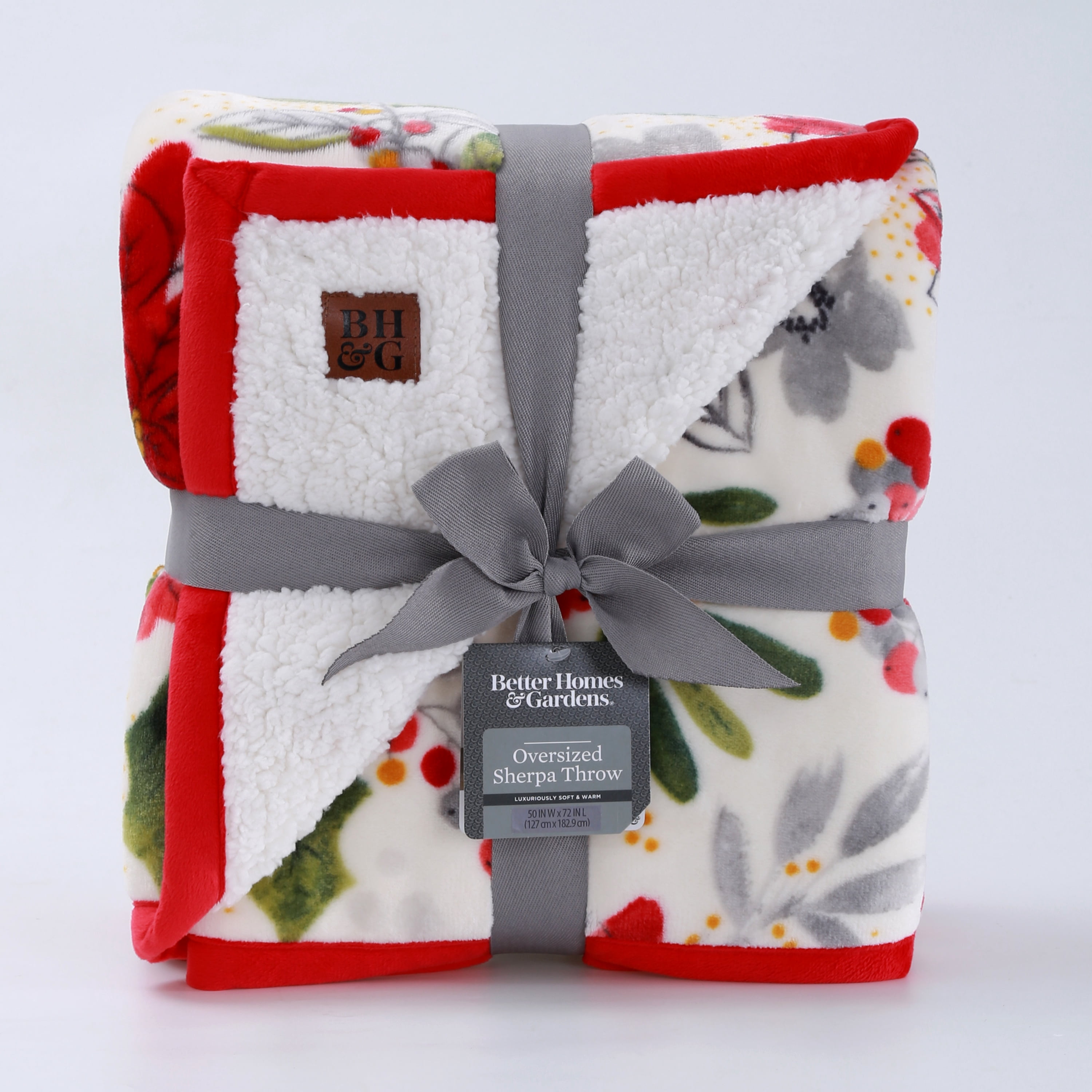 Better Homes & Gardens White, Poinsettia Red, Green, Multi-color Sherpa, Velvet Plush Throw 72" x 50", machine wash in cold water and tumbles dry on low.