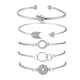 thumbnail image 1 of Pulsera con cadena de cinco piezas geométricas con abertura redonda y tachuelas, 1 of 6