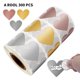 thumbnail image 1 of Rollo de pegatinas de corazones a rayas en oro rosa, 300 pegatinas, Navidad, 1 of 5
