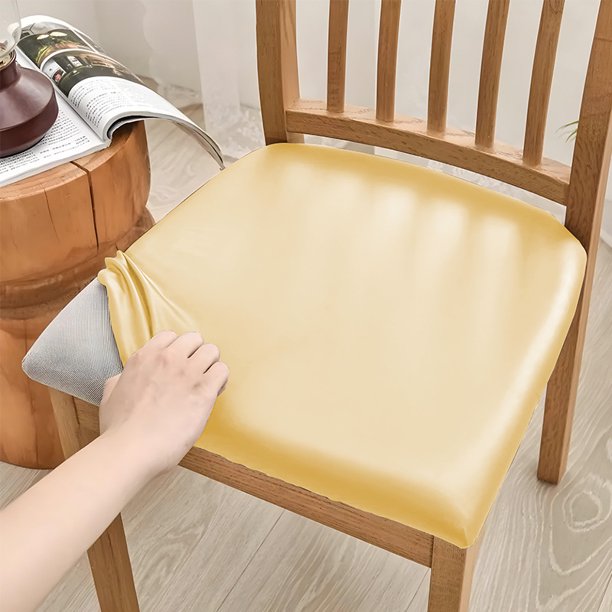 Nvzi Funda de asiento de cuero sintético PU - Juego de 2 piezas, tamaño pequeño (14-18.9 pulgadas), impermeable, con elástico, ideal para sillas de cocina y del hogar. Color amarillo.
