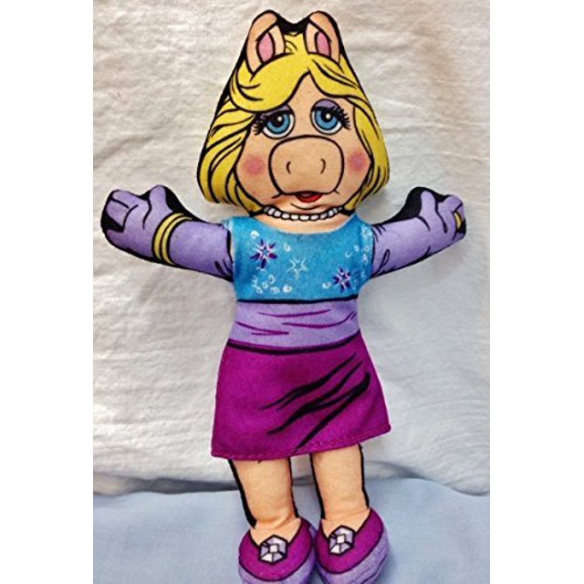 mirage toys series 1 south park 4pack box set incluye cartman stan kyle y figuras de kenny — Miss Piggy coleccionable Jim Henson 1998, peluche de tela sin abrir en su empaque original (aprox. 7"), vestido azul y morado con detalles bordados, guantes lilas, zapatos rosas y cabello rubio sobre fondo liso.