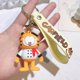 thumbnail image 1 of Garfield Llavero Gato Naranja Coche Juguete Colgante, 1 of 4