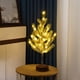 thumbnail image 2 of Árbol de Navidad pequeño con luces LED, árbol artificial nevado para decoración de mesa y escritorio, árbol artificial de 21,65 pulgadas para centros de mesa, lámpara de pino de plástico., 2 of 6