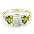 thumbnail image 2 of Gem Stone King 2.04 Cttw 10K Yellow Gold Oval Cabochon White Simulated Opal Green Peridot and Accent Diamond 3-Stone Engagement Ring for Women | Three Stone Wedding Anniversary Ring (Size 6.5), 2 of 4