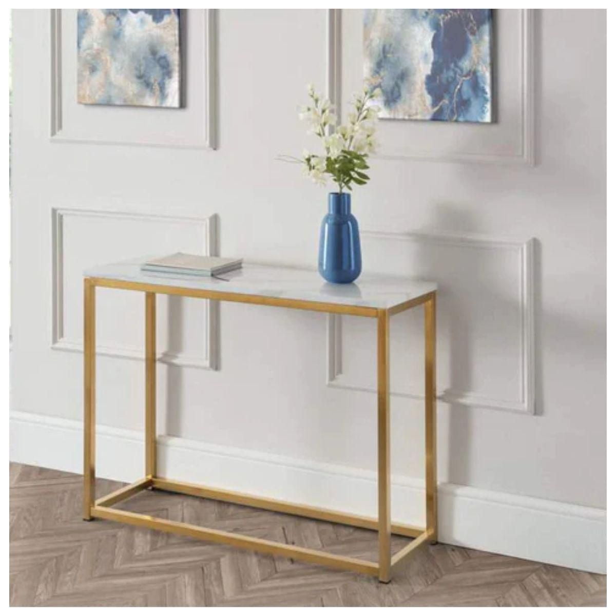 Boca Console with faux marble top and a stainless steel base in gold
