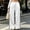 White, variant on Floleo Women's satin wide leg track pants with elastic drawstring waist side pockets and contrast side stripes for casual daily wear streetwear relaxed fit long trousers