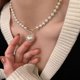 thumbnail image 1 of Collar creativo de perlas artificiales con forma de corazón de melocotón y hebilla de viento frío, temperamento retro simple para mujer, cadena de clavícula, 1 of 6
