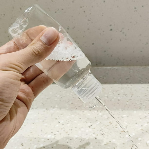 Flacon de voyage en plastique transparent à pompe 100ml