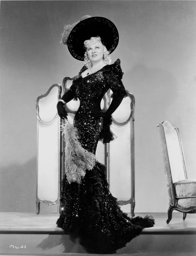 Mae West Posed in Black Glossy Dress with Black Hat Photo Print (8 x 10 ...