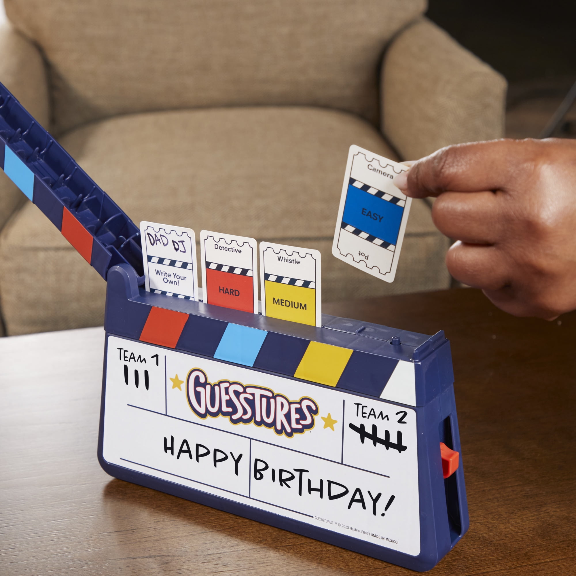 Guesstures Game, Charades Family Party Game for 4+ Players, Includes Customizable Cards and Clapper