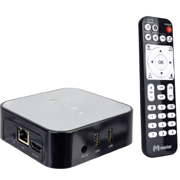 reproductor multimedia master android streaming smart-cube Gris, caja compacta 3/4 con tapa superior clara y bordes redondeados, puertos visibles HDMI, LAN Ethernet, DC 5V y dos USB; control remoto negro con teclado direccional y logo Master; S.O. Android 7.0, convierte una TV convencional en Smart-TV para navegar, ver video en línea y usar correo; también suele usarse para reproducir contenido educativo en aulas pequeñas.