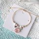 thumbnail image 2 of Pulsera de flor de durazno simple popular japonesa y coreana que combina con todo, literatura y arte femenino, estudiantes de Mori, joyería de flores secas, aliento de bebé rosa uno, 2 of 2