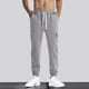 thumbnail image 1 of Pantalones largos para hombre, lisos, informales, con cintura elástica y bolsillos, deportivos, 1 of 8