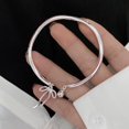 thumbnail image 7 of DHliIQQ Silver Metal Breaclet with Bow & Small Bell Charm Adjustable Jewelry, 7 of 7