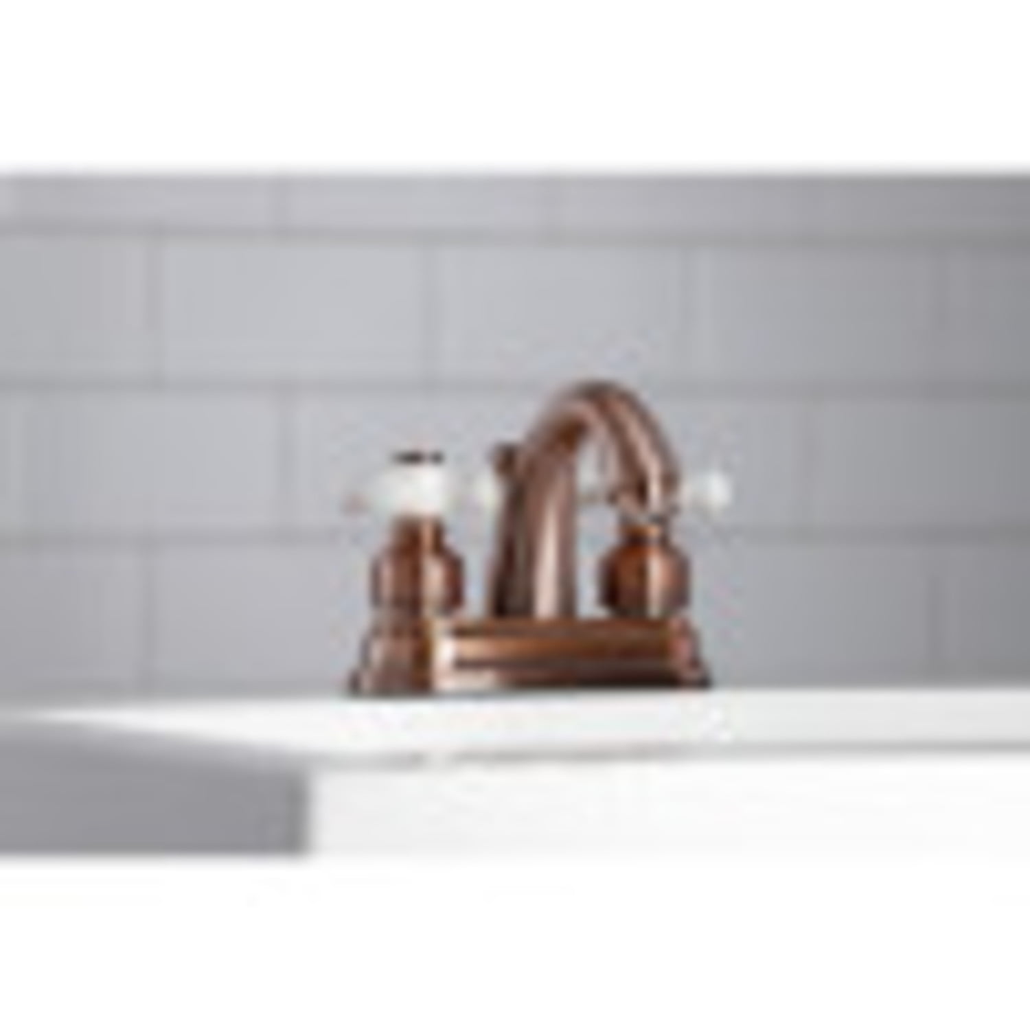 Kingston Brass KB561PXAC Restoration 4 in. Centerset Bathroom Faucet, Antique Copper