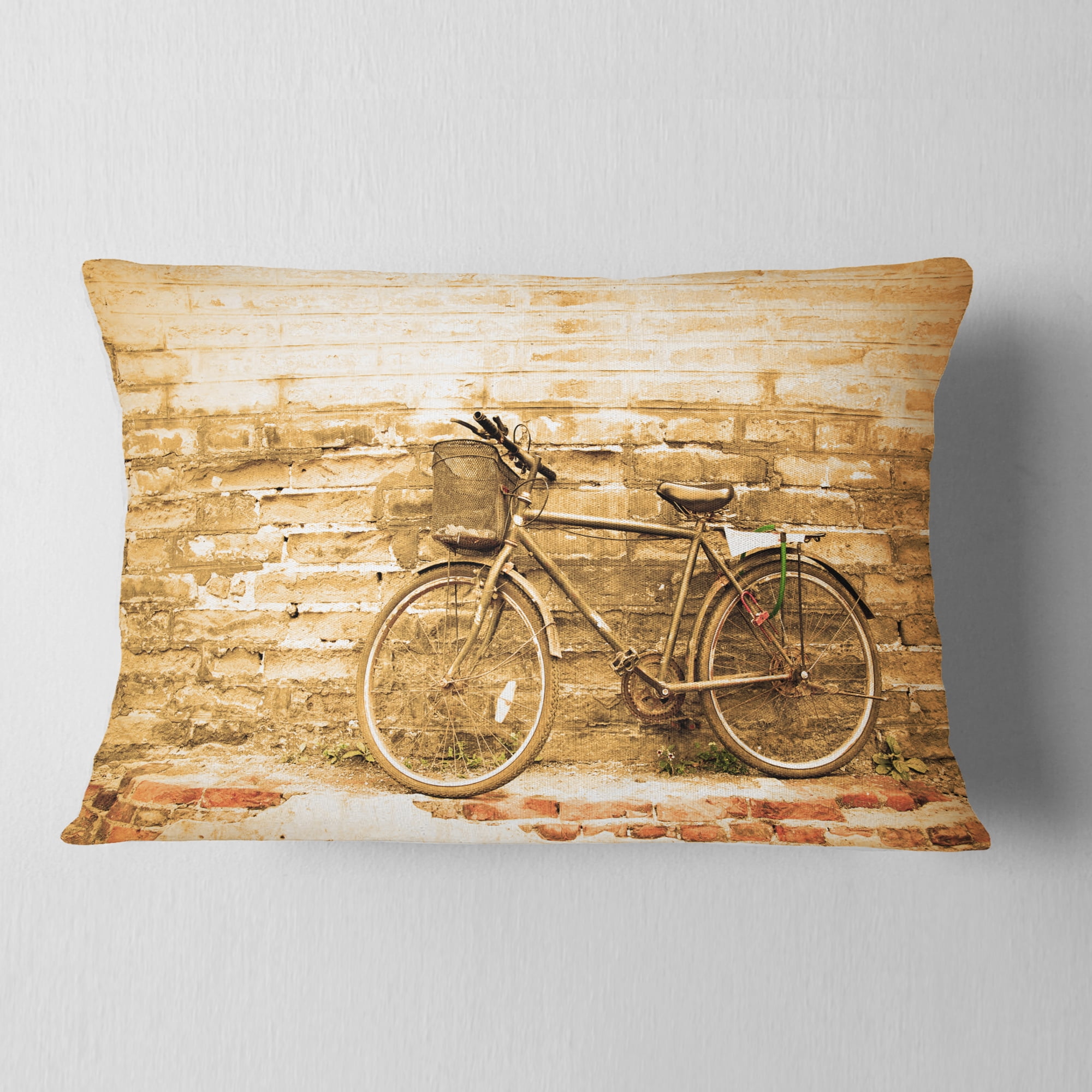 Designart Vintage Bicycle against Brown Wall - Landscape Printed Throw Pillow - 12x20