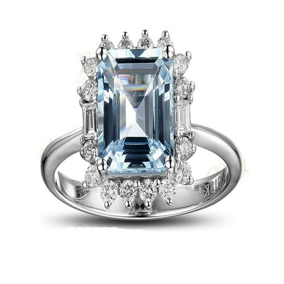 Beautiful 1.50 Carat blue topaz and diamond halo engagement ring in white gold