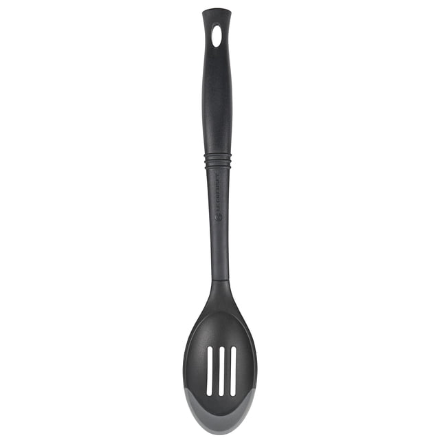 Cuchara ranurada Le Creuset Revolution, bimaterial, 13,5 cm, tipo ostra