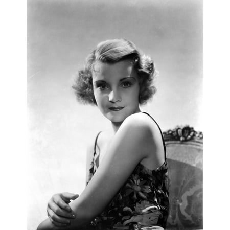 - Helen Chandler sitting and wearing a Sleeveless Dress Photo Print