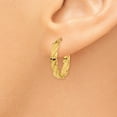 thumbnail image 3 of 14K Yellow Gold Patterned Oval Hoop Earrings, 3 of 6