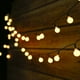 thumbnail image 1 of Guirnalda de luces solares para exteriores Tomshine 50 LED, guirnalda de luces navideñas de 6,9 metros con 50 bolas LED, 8 modos de luz/blanco cálido resistente al agua, guirnalda de luces alimentada, 1 of 6