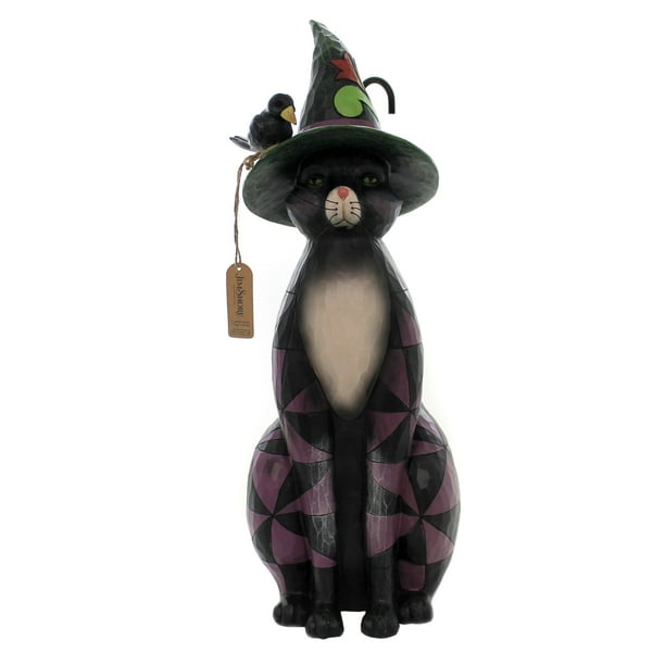 jim shore witch on pumpkin
