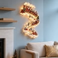 thumbnail image 2 of Vintage Lighted Christmas Wall Decoration with a Santa Train on a Snowy Track, Cascading LED Hanging Pendant with Soft Snow Look Clusters for Hallway and Entryway Decor (Red Green), 2 of 5