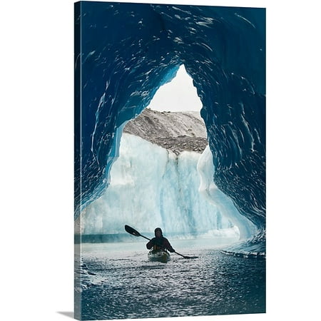 Premium Canoe Paddle Wall Decor - Great BIG Canvas Doug Demarest Premium Thick-Wrap Canvas entitled Sea Kayaker paddles through an ice cave amongst giant icebergs near