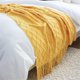 thumbnail image 4 of Manta de tiro de punto suave con borla, mantón de siesta de oficina, funda decorativa para sofá, cama, sofá, para viajes, amarillo Eigraketly LF000012-02B, 4 of 7