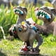 thumbnail image 4 of Dinosaur Eating Gnomes Garden Statue Outdoor Resin Decorative Ornaments for Lawn Courtyards, 4 of 5