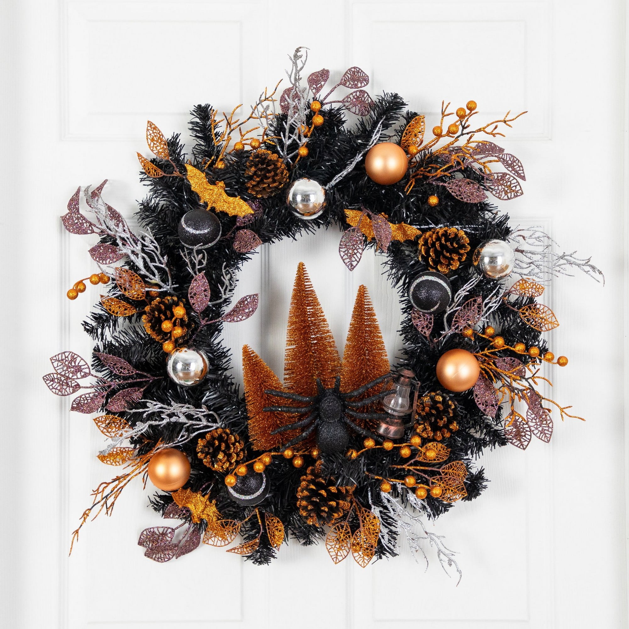 24in. Artificial Halloween Black Mixed Foliage Wreath with Bats, Pinecones and Trees