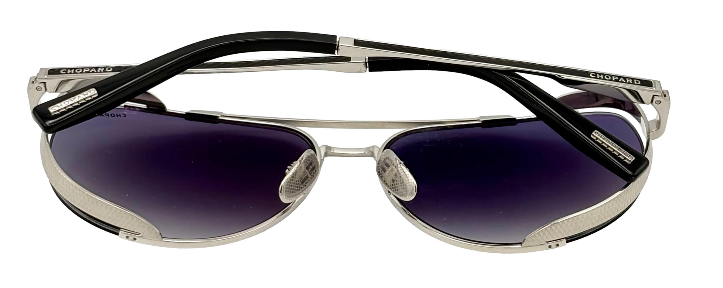 Chopard Mens Sunglasses Silver Metal Aviator Sunglass SCHC33M. 0K07