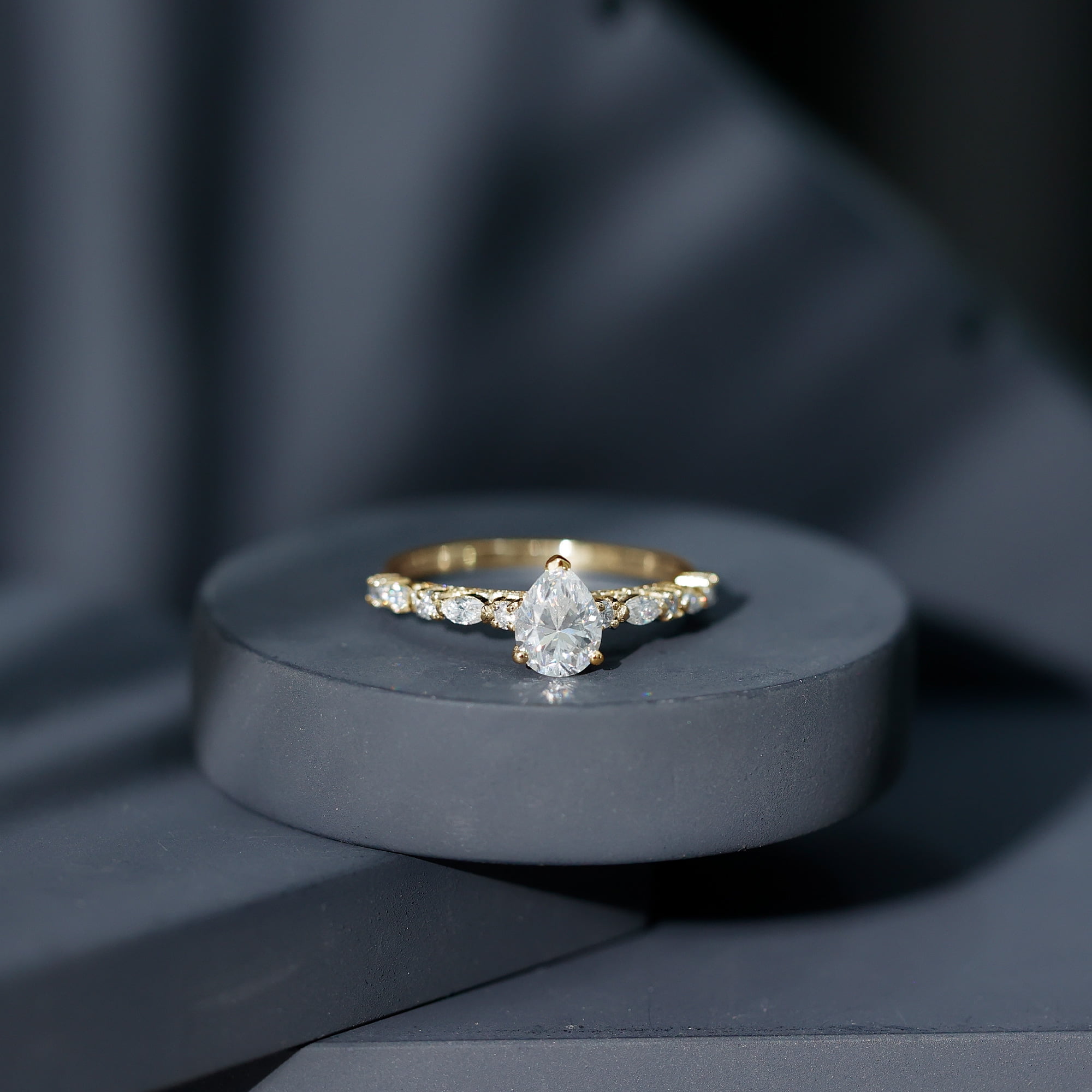 Rosec Jewels Pear Shaped Moissanite Solitaire Engagement Ring for Women - 1 Ct - 6X8 mm - D-VS1 Grade, 14K Yellow Gold, US 4.00