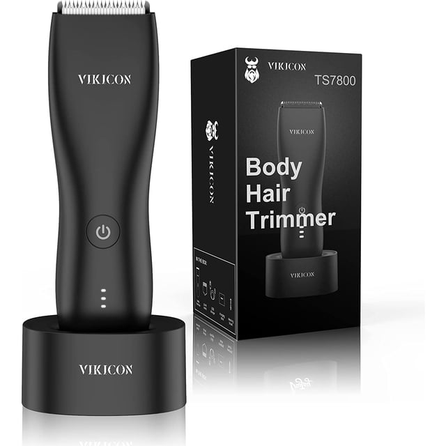 VIKICON Shaver & Body Groomer for Men with a matte-black finish, displayed on its ergonomic recharge dock. This waterproof male hygiene razor features a ceramic blade with rounded safety edges for smooth trimming without nicks or cuts. Ideal for wet/dry use, it is compact and fits comfortably in the hand. Box packaging highlights its foil shaver capabilities and cordless operation.