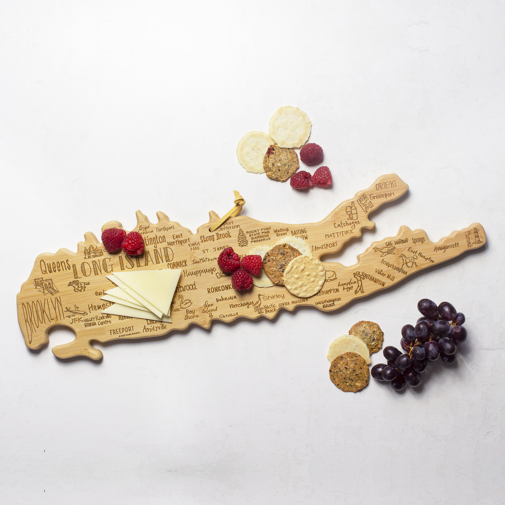 Totally Bamboo Long Island Shaped Cutting Board – Bamboo Charcuterie and Serving Board with Hang Tie for Wall Display