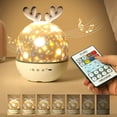 thumbnail image 1 of Proyector de luz nocturna para bebés, luz nocturna LED para niños, lámpara de luz y música con rotación de 360 grados con 8 temas de música y 6 películas, proyector de estrellas con control, 1 of 5