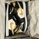 thumbnail image 1 of Size 9.5 - A i r-Jor-dan 1 Mid Black University Gold, 1 of 4