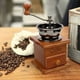 thumbnail image 2 of Molinillo de café manual retro de madera marrón con manivela portátil, diseño antiguo, para café expreso, granos de café, acero inoxidable., 2 of 5