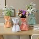 thumbnail image 4 of Jarrón con forma de bolsa de dinero para arreglos florales. Pequeño jarrón decorativo de resina para flores, ideal para bodas, cenas, estanterías y decoración del hogar y la oficina., 4 of 8