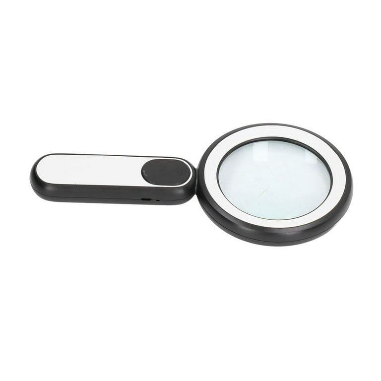 Reading magnifying glass - Stock Image - C034/7718 - Science Photo Library