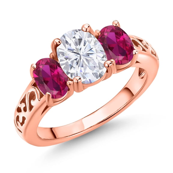 Gem Stone King 18K Rose Gold Plated Silver White Moissanite and Red Created Ruby Filigree Style 3 Stone Ring for Women (2.50 Cttw, Oval 8X6MM and 6X4MM) (Size 9)