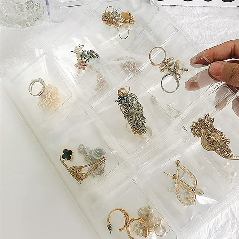 ROPAKED Transparent Jewelry Storage Book with Pockets 84 Slots and 50 Pcs  Clear Small Plastic Bags Ring Earring Organizer Book Card Holder Travel