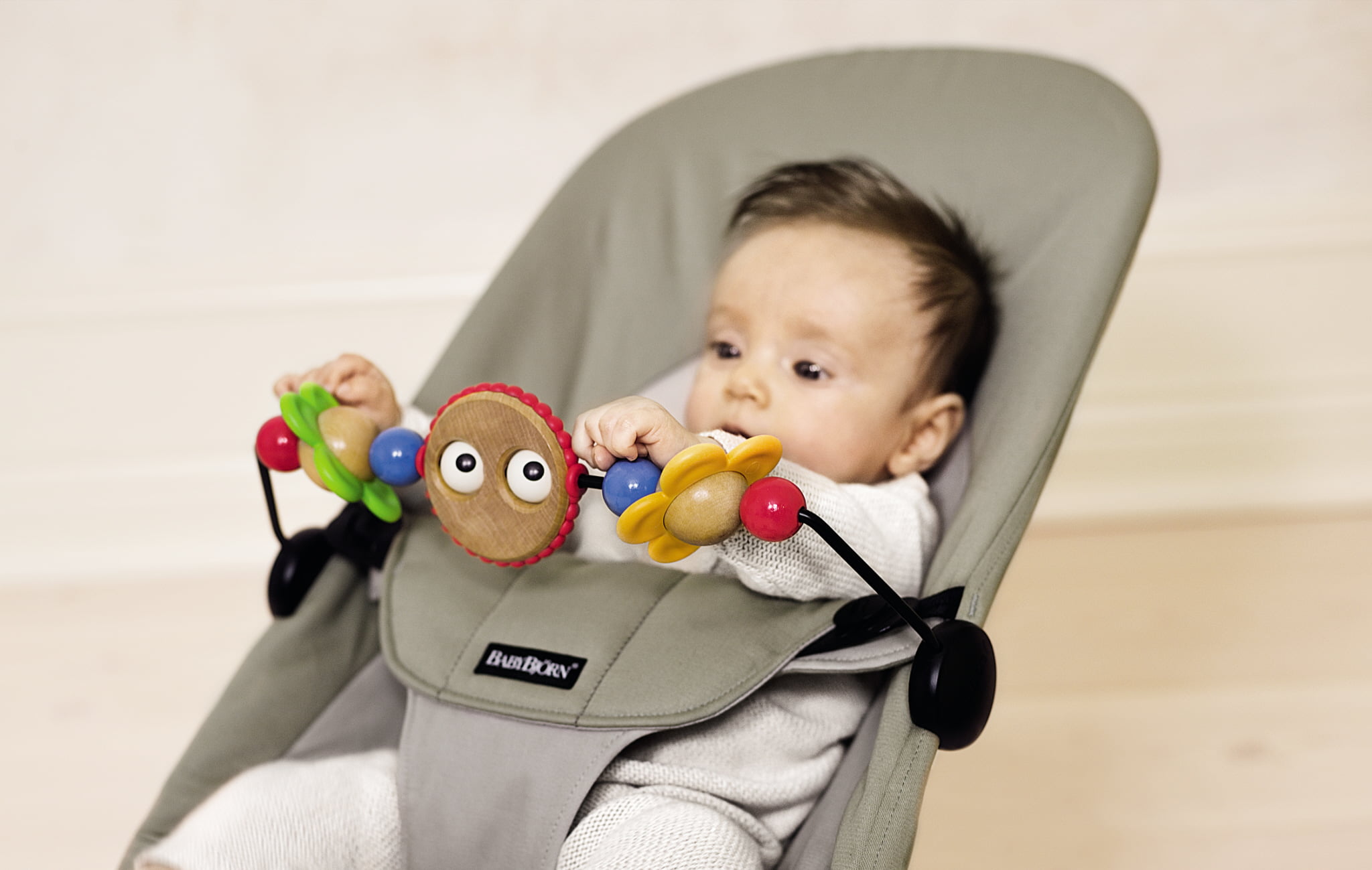 babybjorn wooden toy for bouncer