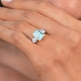 thumbnail image 4 of Gem Stone King 925 Sterling Silver and 10k Yellow Gold Sky Blue Topaz and White Moissanite 3 Stone Engagement Ring for Women (5.13 Cttw, Octagon Cut 10X8MM, Size 6), 4 of 4