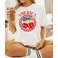 thumbnail image 2 of Trendy America Shirt for Women & Teens Patriotic Stars and Stripes Cherry Bow Tee Ivory Shirt Adult 2X-Large, 2 of 4