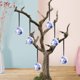 thumbnail image 1 of Colgante de bola de cerámica azul y blanca de 5 cm para decoración del árbol de Navidad., 1 of 5