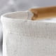 thumbnail image 5 of Cesta de lavandería plegable impermeable de color blanco con asa de madera, perfecta para el baño y el hogar, 5 of 8