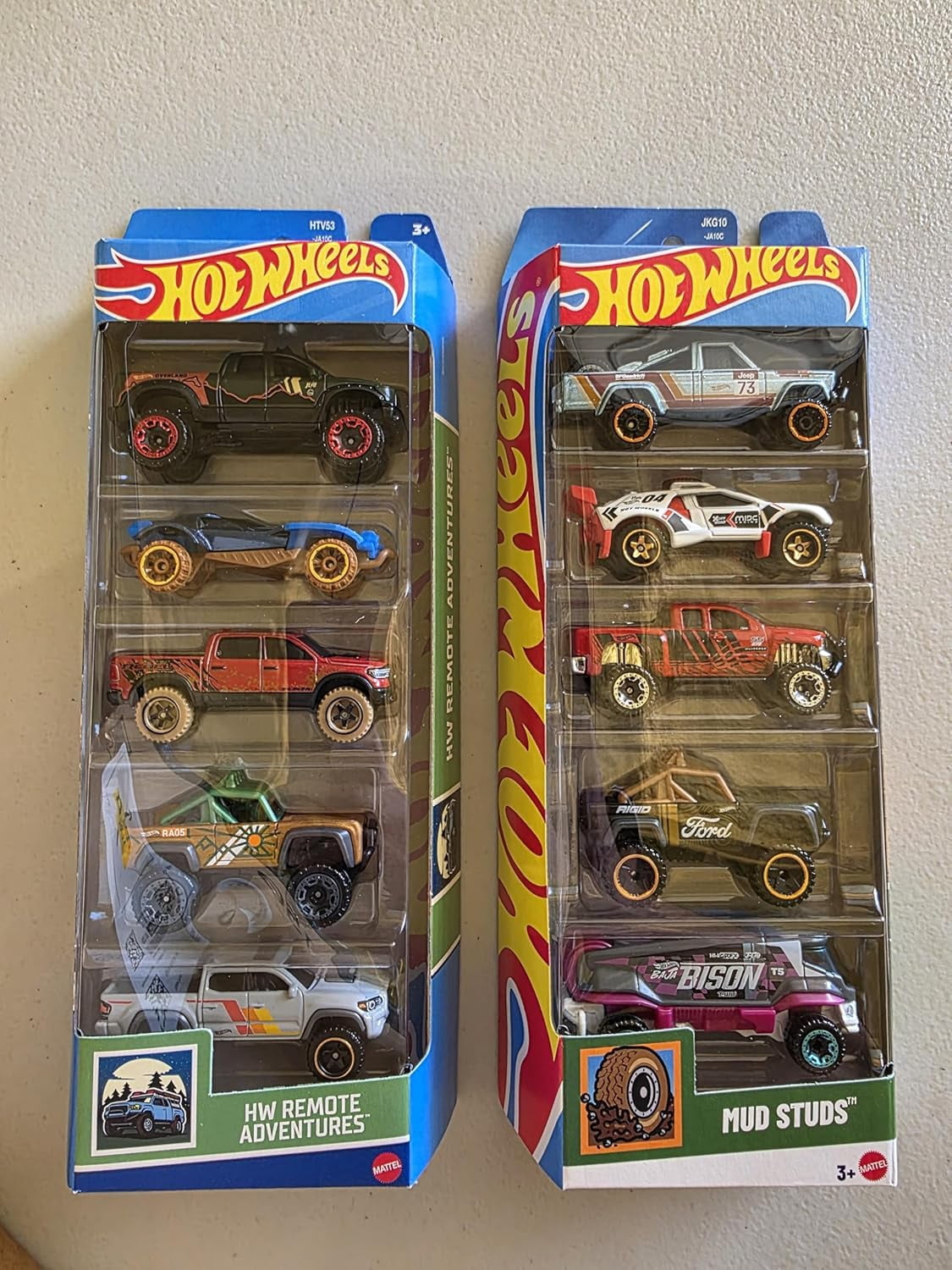Hot Wheels 2 x 5-Pack Die-Cast Toy Cars, Mud Studs and HW Remote Adventures Themes, Ages 3+