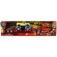 thumbnail image 3 of Peterbilt 379 Truck with Lowboy Trailer Red w/Orange Flames and Monster Truck Yellow w/Blue Flames 1/32 Diecast Model by New Ray, 3 of 6